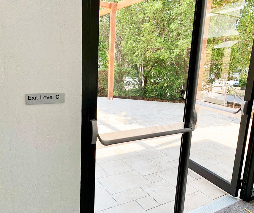 Braille & Tactile Exit Level Ground Sign – Bractile